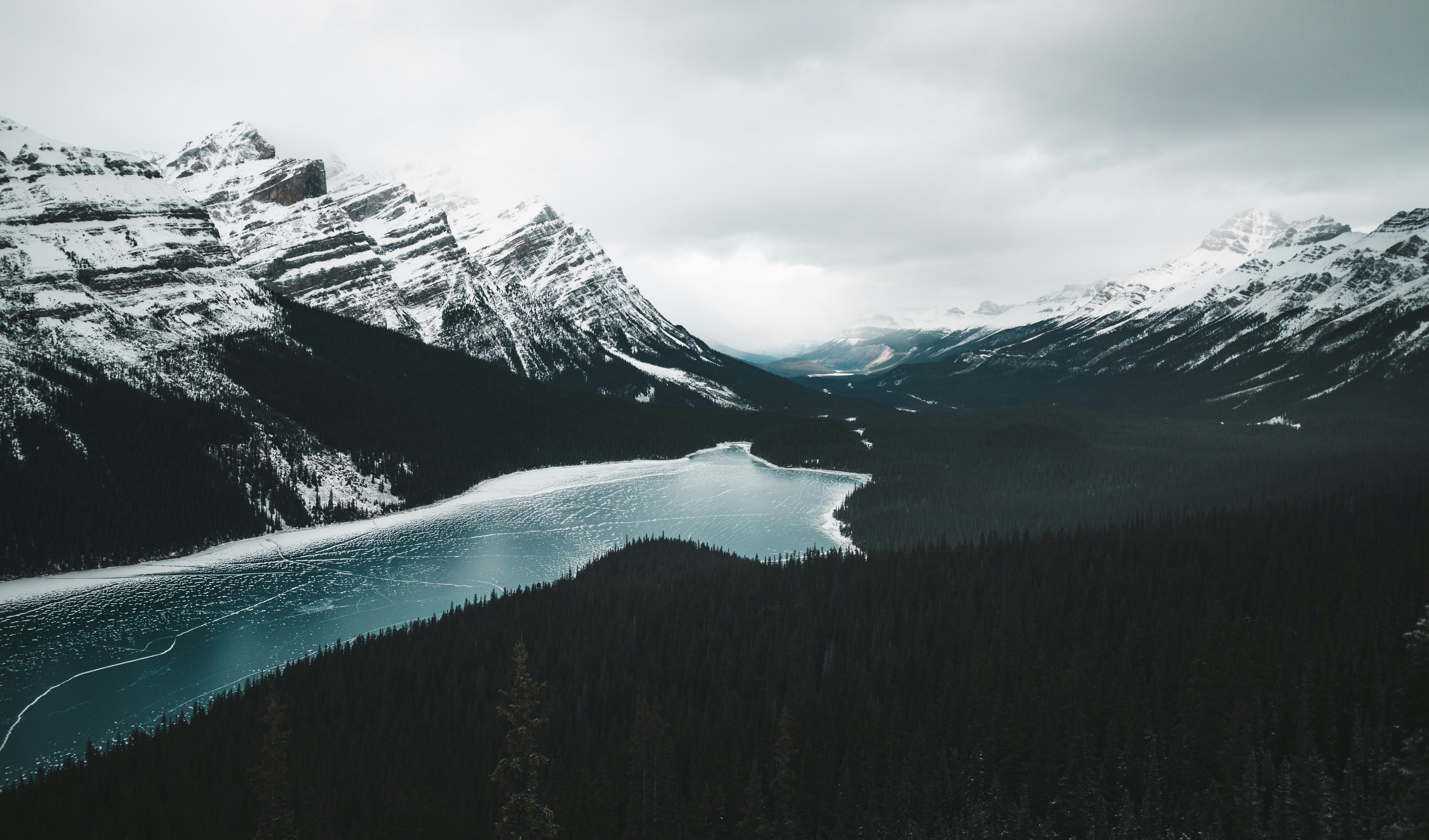 body of water near mountain